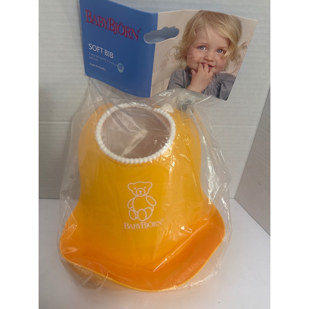 BabyBjorn Soft Bib yellow Deep Spill Pocket BPA Free Adjustable Neckband NIP